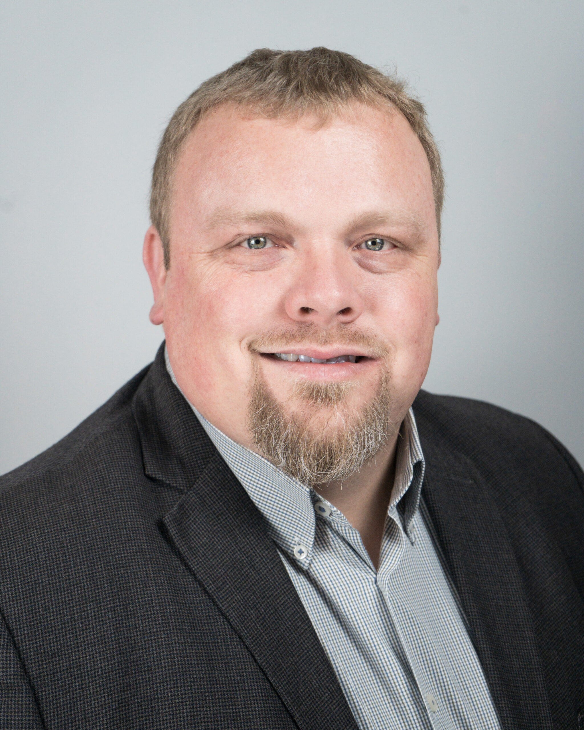 Professional headshot of Jonathan Whitten, CPA. He is the Principal and owner of Cornerstone Financial CPA.